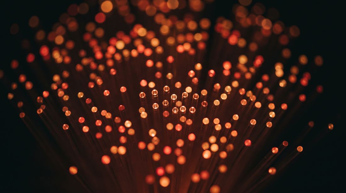 The glowing tips of a bundle of optical fibres